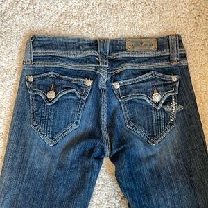 Women’s dark blue jeans size 27, 33.5 cotton elastin 2% Sang Real boot stretch